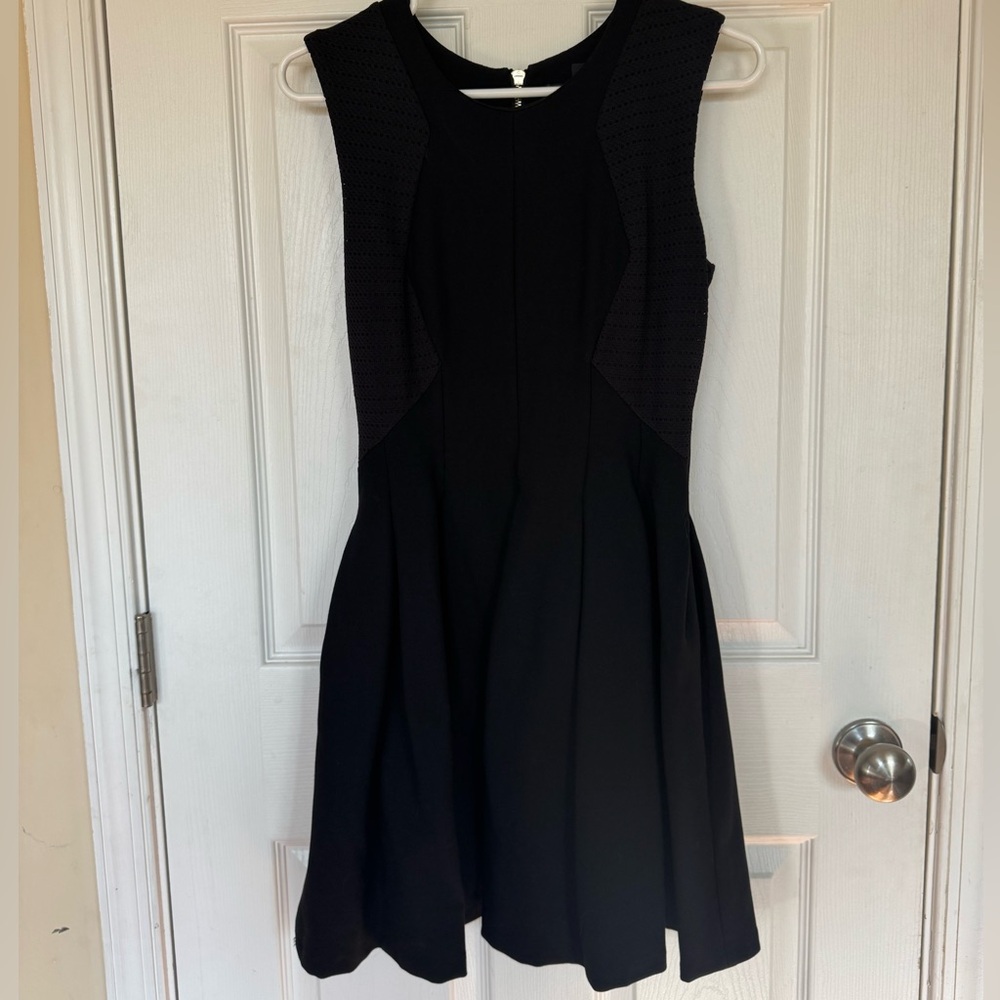 Size small BCBGMaxazria dress, black w/pleats in the skirt and two textured top